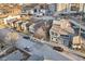 Aerial view of homes, showcasing the neighborhood, street, and surrounding urban development at 546 E Merrill St, Indianapolis, IN 46203