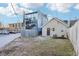 View of a backyard with a detached living quarters, adjacent to contemporary homes at 546 E Merrill St, Indianapolis, IN 46203