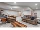 Spacious finished basement area with comfortable seating and recreational space for entertainment at 5517 Westbourne Ct, Greenwood, IN 46143