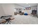 Finished basement with carpet, piano, tv and recliners at 5517 Westbourne Ct, Greenwood, IN 46143
