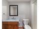 Clean, well-lit bathroom with a marble vanity, modern fixtures, and a shower-tub combination at 5517 Westbourne Ct, Greenwood, IN 46143