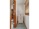 Powder room features white vanity with chrome faucet, and wood trim at 5517 Westbourne Ct, Greenwood, IN 46143