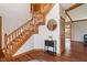 Spacious foyer with a staircase, hardwood floors, and stylish decor at 5517 Westbourne Ct, Greenwood, IN 46143