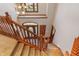 Bright foyer showcases staircase, beautiful entry door with sidelights, and hardwood floors at 5517 Westbourne Ct, Greenwood, IN 46143