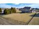 Large fenced backyard with a well-maintained lawn, perfect for outdoor activities and relaxation at 5842 Oakmont Blvd, Bargersville, IN 46106