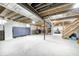 Unfinished basement with exposed ceiling and concrete floor, ready for customization at 5842 Oakmont Blvd, Bargersville, IN 46106