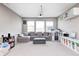 Versatile finished basement featuring a cozy seating area and well-lit space for activities at 5842 Oakmont Blvd, Bargersville, IN 46106