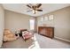 Neutral bedroom designed for a showcases a ceiling fan, wooden dresser and toddler bed creating a cozy atmosphere at 5842 Oakmont Blvd, Bargersville, IN 46106