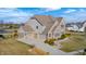 Stunning two-story home with beautiful landscaping, attached garages and a serene backyard pond at 5842 Oakmont Blvd, Bargersville, IN 46106