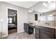 Bright bathroom boasts double sinks, walk in closet, and a view of the main bedroom at 5842 Oakmont Blvd, Bargersville, IN 46106