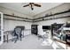 Bright office space featuring built-in shelving, carpet, and ample workspace at 5842 Oakmont Blvd, Bargersville, IN 46106