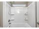 Clean, bright shower space with built-in shelving, modern fixtures and a window, offering functionality and convenience at 5842 Oakmont Blvd, Bargersville, IN 46106