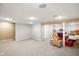 Finished basement with neutral carpet, paneled walls, and recessed lighting ready for finishing at 6144 Maple Branch Pl, Indianapolis, IN 46221