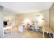 Spacious bedroom area with desks, lighting, and ample space for activities at 6144 Maple Branch Pl, Indianapolis, IN 46221