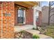 A welcoming front porch with brick accents and clear view of the house number at 6144 Maple Branch Pl, Indianapolis, IN 46221