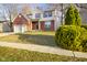 Inviting home with lush green landscaping, providing excellent curb appeal at 6144 Maple Branch Pl, Indianapolis, IN 46221
