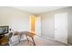 Simple office featuring a large desk, light gray walls, and a doorway at 6144 Maple Branch Pl, Indianapolis, IN 46221
