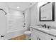 Bathroom with granite vanity top and shower-tub combo at 617 W 39Th St, Indianapolis, IN 46208