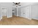 Bedroom featuring light wood floors and ensuite bathroom at 617 W 39Th St, Indianapolis, IN 46208