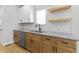 Well-appointed kitchen with modern cabinetry, stainless steel dishwasher, and granite countertops at 617 W 39Th St, Indianapolis, IN 46208