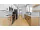 Modern kitchen with stainless steel appliances, granite counters, and stylish cabinets at 617 W 39Th St, Indianapolis, IN 46208