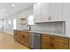 Updated kitchen with stainless appliances, granite counters, and ample storage at 617 W 39Th St, Indianapolis, IN 46208