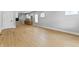 Spacious living room features modern flooring, neutral walls, and natural light from multiple windows at 617 W 39Th St, Indianapolis, IN 46208