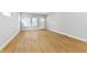 Bright living room with modern flooring, fresh paint, and ample natural light at 617 W 39Th St, Indianapolis, IN 46208