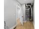 Utility room featuring modern furnace, new flooring, and access to additional rooms at 617 W 39Th St, Indianapolis, IN 46208