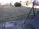 Good-sized grass backyard featuring a swing and an area for relaxing at 6651 Sonesta Dr, Indianapolis, IN 46217