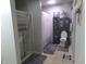 Well-lit bathroom with a glass-enclosed shower, neutral tiling, and updated fixtures create a clean aesthetic at 6651 Sonesta Dr, Indianapolis, IN 46217