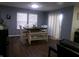 Cozy dining room with modern wooden table and white chairs and bench seating at 6651 Sonesta Dr, Indianapolis, IN 46217