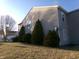 Exterior showcasing siding and lawn, with trees outlining the property at 6651 Sonesta Dr, Indianapolis, IN 46217