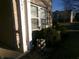 Home exterior displaying a brick facade, plants, and a neatly kept front yard at 6651 Sonesta Dr, Indianapolis, IN 46217