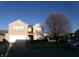 Exterior view featuring a two-story house with a brick facade and a landscaped front yard at 6651 Sonesta Dr, Indianapolis, IN 46217
