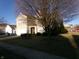 Residential property exterior with a well-maintained lawn and prominent trees at 6651 Sonesta Dr, Indianapolis, IN 46217