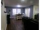 Open-concept living room with modern furniture and natural light creates a comfortable gathering space at 6651 Sonesta Dr, Indianapolis, IN 46217