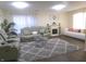 Bright living room with stylish seating, fireplace, and decorative accents at 6651 Sonesta Dr, Indianapolis, IN 46217