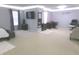 Spacious main bedroom featuring neutral color walls, and carpeted floors at 6651 Sonesta Dr, Indianapolis, IN 46217