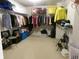 Spacious walk-in closet offers plenty of storage, shelving, and organization space for clothing and accessories at 6651 Sonesta Dr, Indianapolis, IN 46217