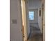 Hallway leading to other rooms, showcasing neutral paint and carpeted floors at 7128 Moon Ct, Indianapolis, IN 46241