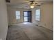 Main living area with natural light showcasing a ceiling fan at 7128 Moon Ct, Indianapolis, IN 46241
