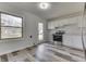 Bright kitchen boasts sleek stainless steel appliances, white cabinets, subway tile backsplash and stylish floor at 7602 E 34Th Pl, Indianapolis, IN 46226