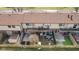 Aerial view of townhouses showcasing private backyards, patios, and a well-maintained outdoor setting at 8 Greenwood Trail S Dr, Greenwood, IN 46142