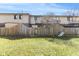 Fenced backyard with grass, offering privacy and space for outdoor activities at 8 Greenwood Trail S Dr, Greenwood, IN 46142