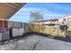 Cozy backyard patio with a concrete pad, wood fence, and storage shed perfect for outdoor relaxation at 8 Greenwood Trail S Dr, Greenwood, IN 46142