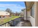 Balcony provides a tranquil view of the community with green spaces and neighboring homes at 8 Greenwood Trail S Dr, Greenwood, IN 46142