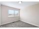 This cozy bedroom features plush carpeting and a bright window with pleasant views at 8 Greenwood Trail S Dr, Greenwood, IN 46142