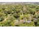 Aerial view of homes nestled within a lush canopy of trees, offering a private and serene environment at 8808 Manderley Dr, Indianapolis, IN 46240