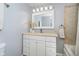 Bathroom featuring a bathtub and vanity with wall mirror at 8808 Manderley Dr, Indianapolis, IN 46240